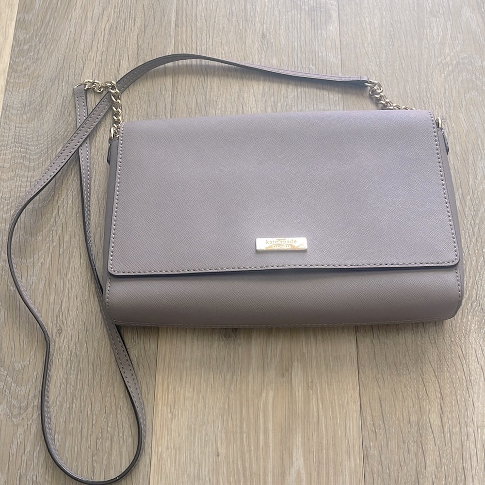 Kate spade grey crossbody. Used. Approximate dimensions: 10”x7”x2”.